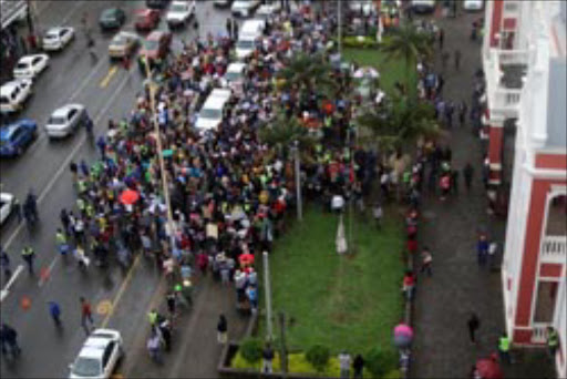 April 07, 2017.Crowds seen in front of the East London city hall during their March against president Jacob Zuma . . Picture: MICHAEL PINYANA © DAILY DISPATCH