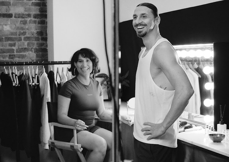 RAYE and Zlatan backstage for their H&M shoot.