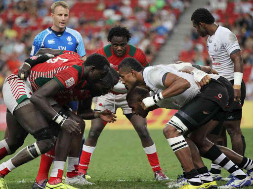 Fiji and Kenya contest the Singapore Sevens World Series final at the National Stadium, Singapore. /COURTESY