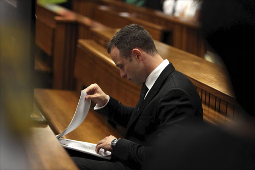 Oscar Pistorius at the Pretoria High Court on March 5, 2014, in Pretoria, South Africa. Oscar Pistorius, stands accused of the murder of his girlfriend, Reeva Steenkamp, on February 14, 2014. This is Pistorius' official trial, the result of which will determine the paralympian athlete's fate. (Photo by Alon Skuy/The Times/Gallo Images - Pool/Getty Images)