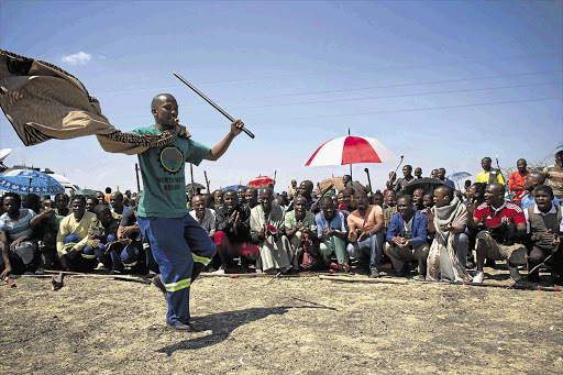 Marikana miners protest at Lonmin's mine near Rustenburg last week Picture: DANIEL BORN