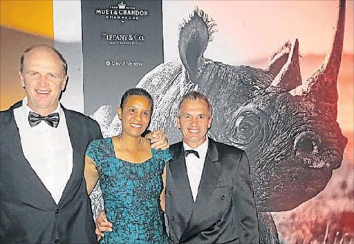 RHINO WHISPERER: Tusk Award Winner 2016 conservationist Cathy Dreyer is flanked by Dr William Fowlds, left, and Dr David Zimmermann, who nominated her for the award Picture: SUPPLIED