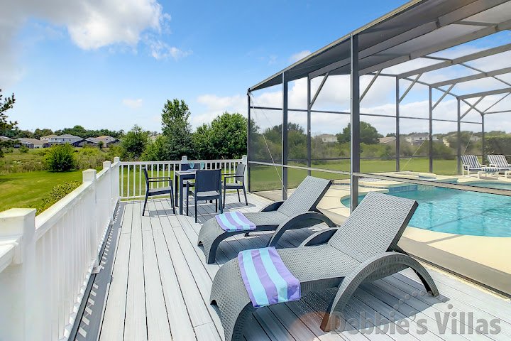 Soak up the sun on the decking at this Davenport vacation villa