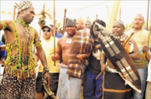 FINE HOMECOMING: Fikile Mbalula is welcomed by family members, friends and comrades, including Tony Yengeni, at his home in Bloemfontein, Free State. Pic. Peter Mogaki. 04/10/08. © Sowetan.