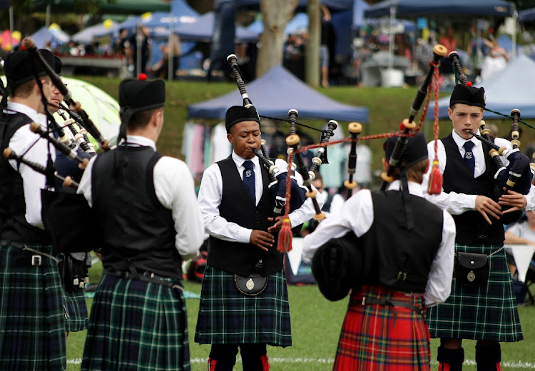 St Andrews College from Makhanda in the Eastern Cape compete under novice juvenile at the 2024 Highland Gathering in Hutchison Park in Amanzimtoti, Durban.