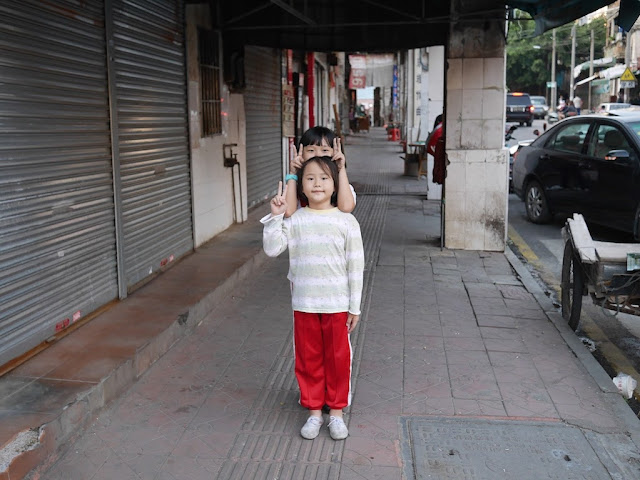 two girls posing for a photo in Shaoguan, Guangdong