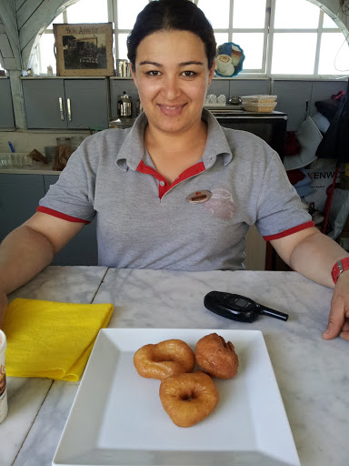 Offering freshly made donuts in Sirince, Turkey. From International Women's Day: A Celebration of Travel