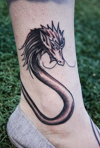 girl dragon tattoo