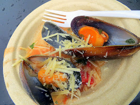 Mussels that come prepackaged in broth and precooked, just warm and add your garnish of Parmesan! At Whole Foods