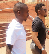 Thembinkosi Lorch and his friend Thato Matoka leaving the Randburg magistrate's court on Monday. 