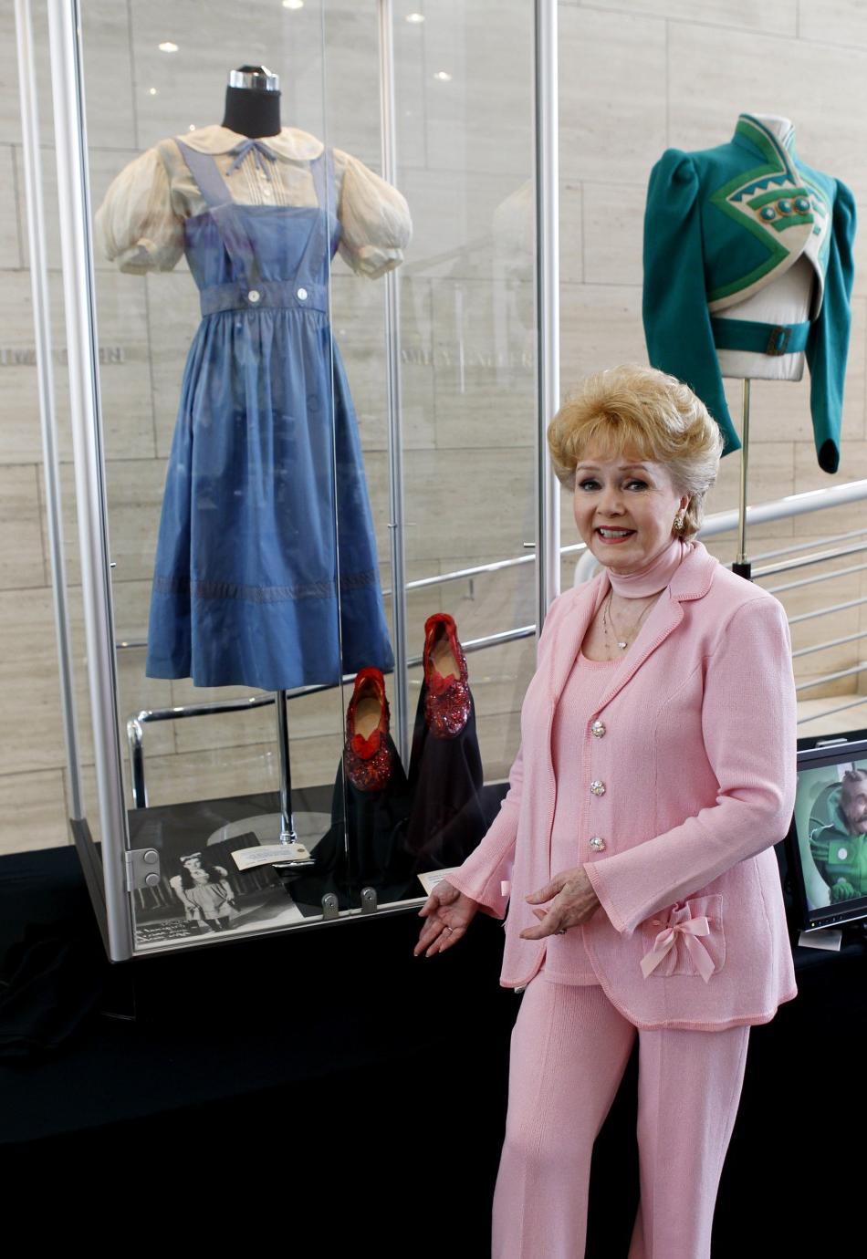 Actress Debbie Reynolds poses