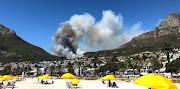 Smoke billows from The Glen, in Camps Bay, on February 7 2019.