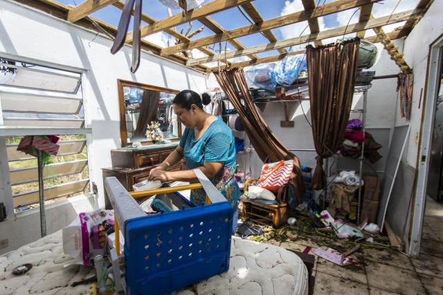 Meryanne Aldea lost everything at her house when the winds of Hurricane Maria ripped away the roof. The mountain town of Juncos is one of the most affected areas in Puerto Rico, and it remains largely isolated from the rest of the island &mdash; and the world. Photo: DENNIS M. Rivera Pichardo / The Washington Post