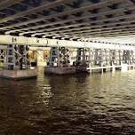 cool metal bridge next to central station Amsterdam in Amsterdam, Netherlands 