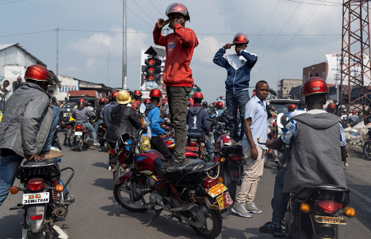 Activists gesture as they call for an end to the fighting between the M23 rebels and the Congolese army, in Goma, the Democratic Republic of Congo, February 19 2024. Picture: ARLETTE BASHIZI/REUTERS