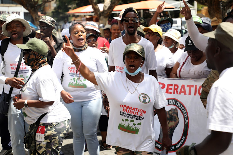 Members of Operation Dudula during one of their campaigns allegedly to root out illegal immigrants in Orange Grove, Johannesburg, recently. A court bid by foreign nationals to halt the campaign has been thrown out of court.