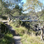 Riverside track passing foot bridge (274022)