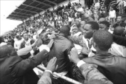 GOOD GRIEF: Jacob Zuma and Thabo Mbeki supporters from the ANCYL and Sasco vent their feelings at the funeral of Norman Mashabane. Pic. Khaya Ngwenya. © City Press