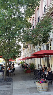 LeChon's sidewalk tables that face towards the waterfront of Portland