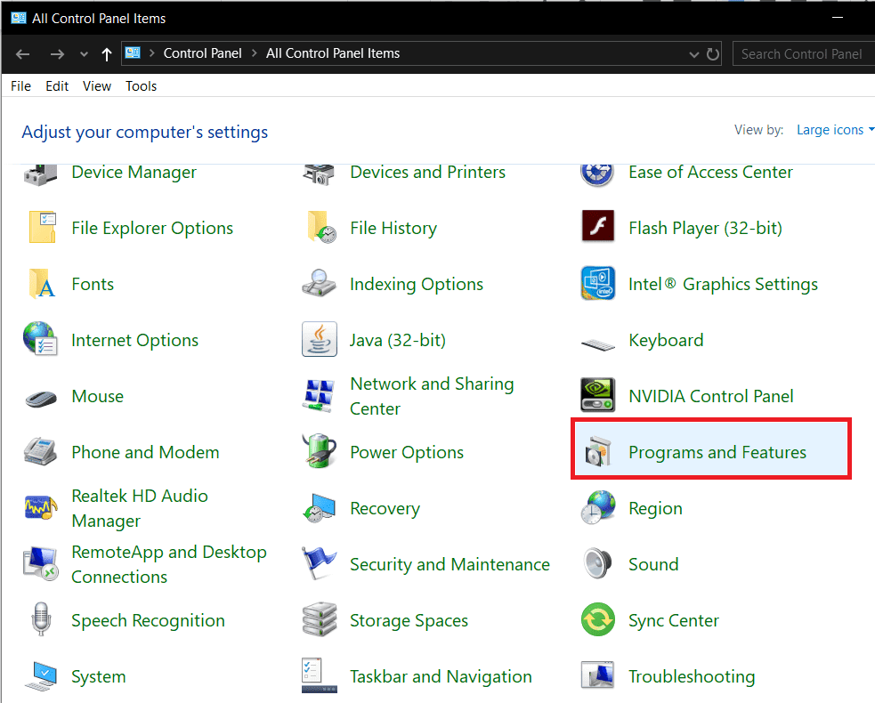 Abra el Panel de control y haga clic en Programas y características