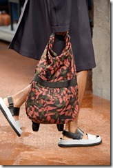 MILAN, ITALY - JUNE 18:  A model, bag detail, walks the runway at the Marni show during  Milan Men's Fashion Week Spring/Summer 2017 on June 18, 2016 in Milan, Italy.  (Photo by Pietro D'Aprano/Getty Images for Marni)