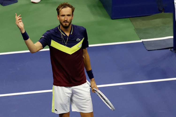 Daniil Medvedev celebrates after his match against Carlos Alcaraz of Spain (not pictured) in a men's singles semifinal on day twelve of the 2023 US Open tennis tournament at USTA Billie Jean King Tennis Center.