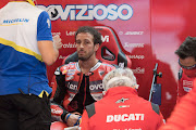 Andrea Dovizioso of Italy and Ducati Team speaks with mechanics during qualifying for the MotoGP of Catalunya at Circuit de Barcelona-Catalunya on September 26 2020 in Barcelona.