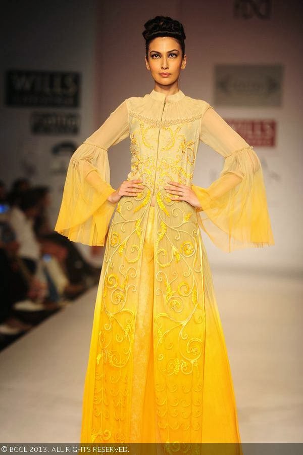 Sanea displays a creation by fashion designer Sulakshana on Day 5 of Wills Lifestyle India Fashion Week (WIFW) Spring/Summer 2014, held in Delhi.
