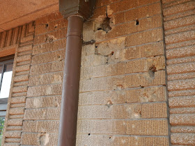 chipped bricks in a wall