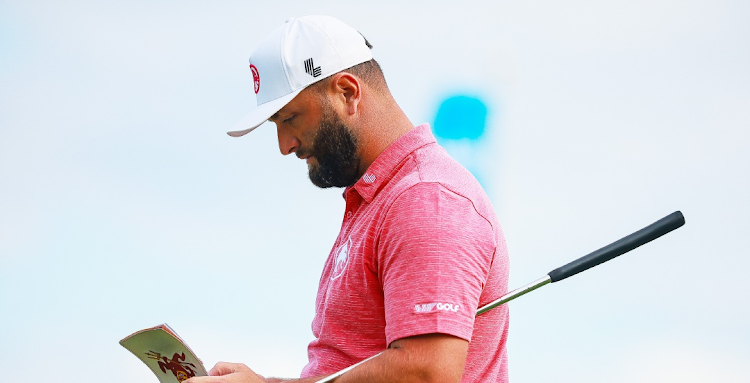 Jon Rahm makes notes the LIV Golf Invitational at Mayakoba at El Camaleon on February 3, 2024 in Playa del Carmen, Mexico. File photo: MANUEL VELASQUEZ/GETTY IMAGES