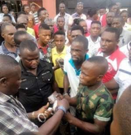 Young soldier apprehended in Warri, Delta State for allegedly stealing iPhone