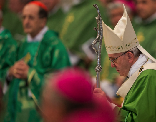 Francis behind cross