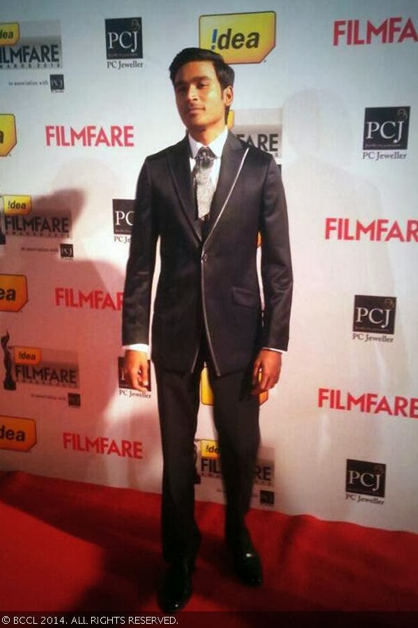 Dhanush looks dapper as he walks the red carpet for the 59th Idea Filmfare Awards 2013, held at the Yash Raj Studios in Mumbai, on January 24, 2014.