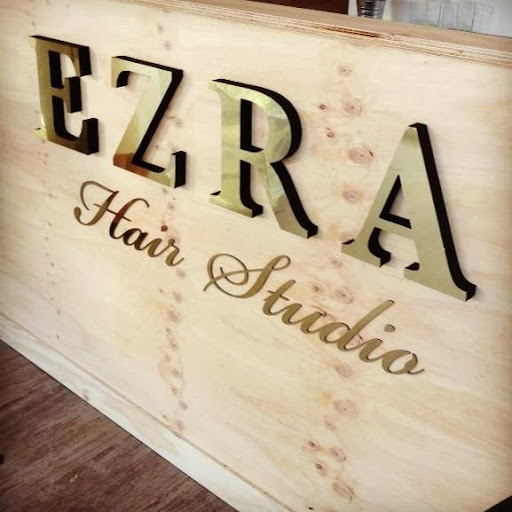 EZRA Hair Studio logo