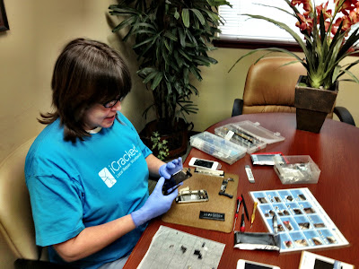 Katherine from iCracked.com repairing iPhones on site at our First American Title branch in Kent, Washington.