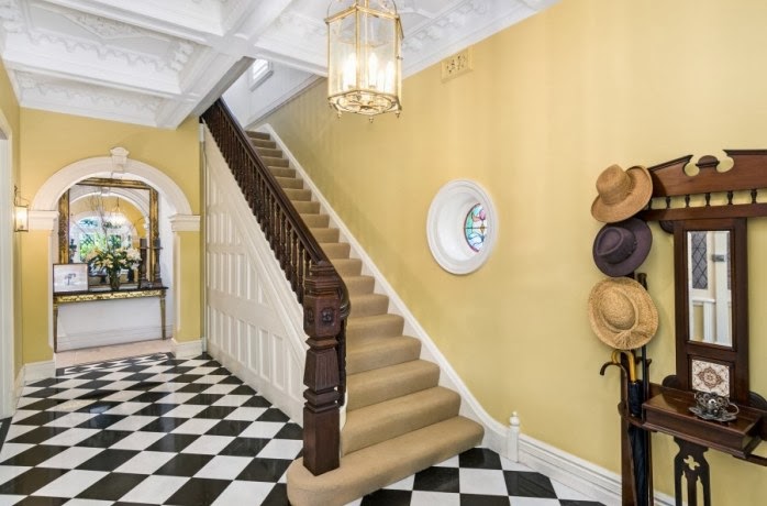 Black and white tiling is a Victorian favourite; coffered ceiling has masterly decoration