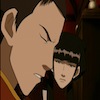 Zuko in profile looking upset, while Mai looks on