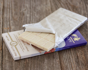 a photo showing packages of strawberries and cream chocolate