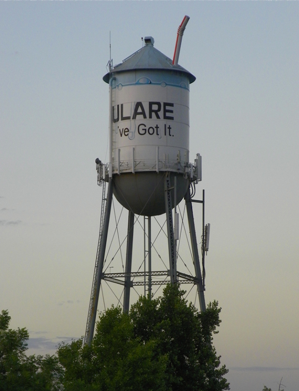 Unique water tower in Tulare, California, 10 July 2010. The slogan reads, 'We've Got It'. Notice the milk painted on the side and the big straw. Photo: Dusty_73 / flickr