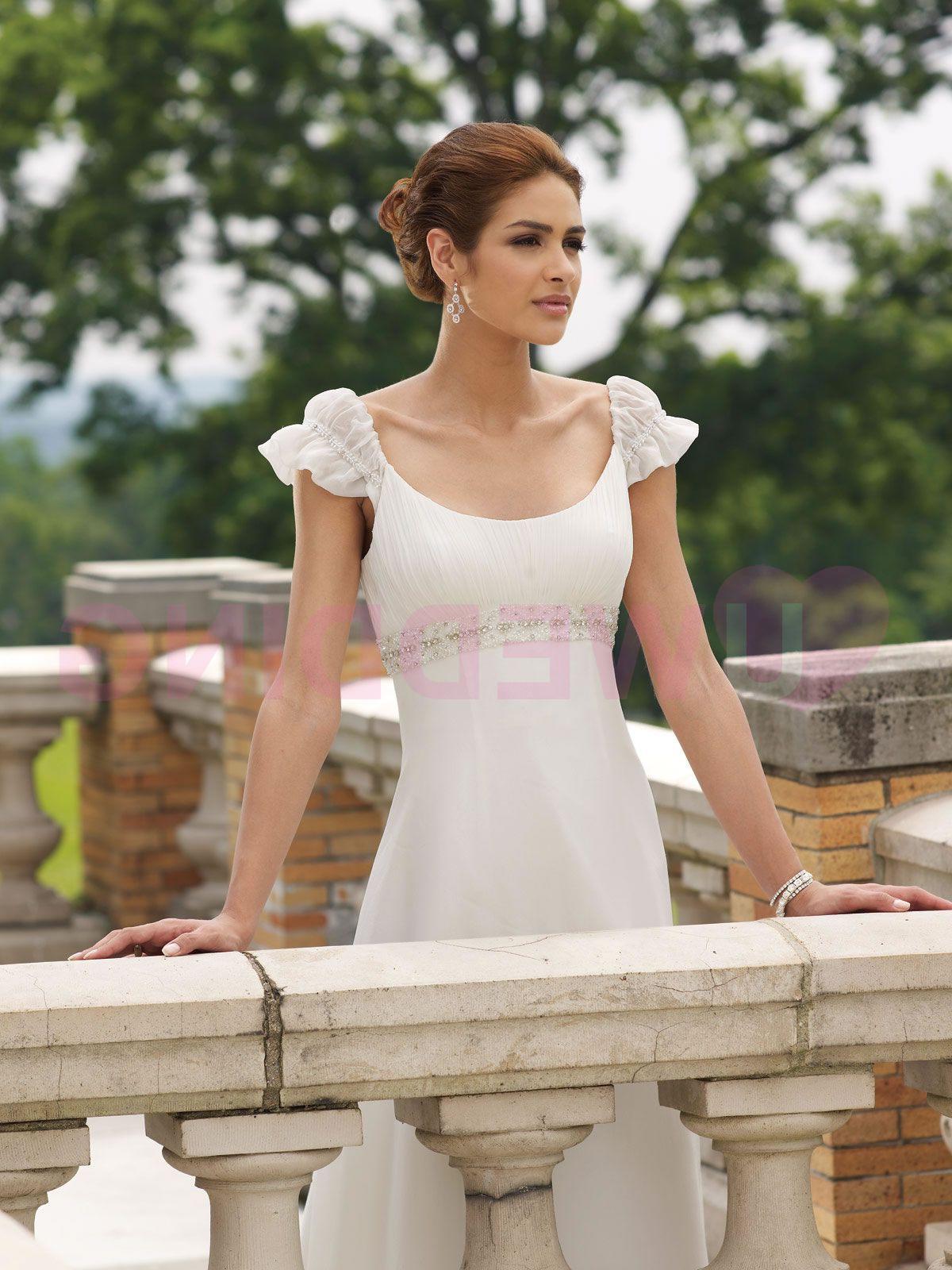 Silk chiffon soft A-line gown with cap sleeves features hand-beaded trim and