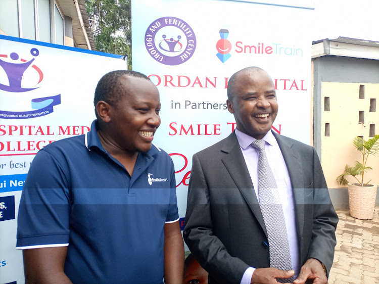 Smile Train Programme Manager for East Africa, Joseph Kariuki and Dr Joshua Matu.