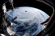 Super Typhoon Trami is seen from the International Space Station as it moves in the direction of Japan, September 25, 2018 in this image obtained from social media on September 26, 2018. 