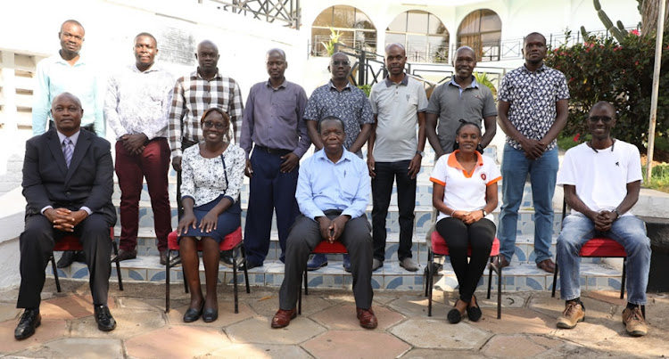 Masinde Muliro university Vice Chancellor Solomon Shibairo with University Solar Photovoltaic Energy Project Committee members.