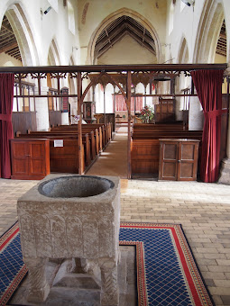 St Margarets interior with font and aisle 