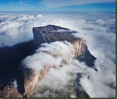 Mount Roraima is the highest tepui reaching 2810 meters in elevation. These cloud covered flat top mountains are considered to be some of the oldest geological formations on Earth. --- Image by © Martin Harvey/Corbis