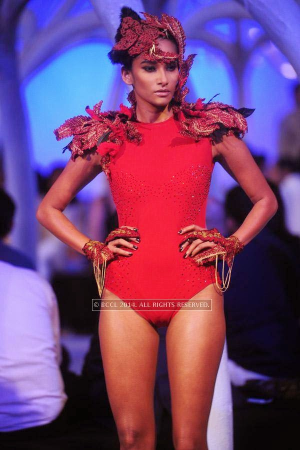 A model walks the ramp during Shantanu and Nikhil's Autumn Winter Couture show in association with Johnnie Walker Black Label and JW Marriott New Delhi Aerocity.