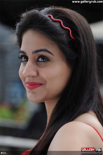 Aksha looks hot in a red dress during a photoshoot.www.galleryrub.com <br /> 