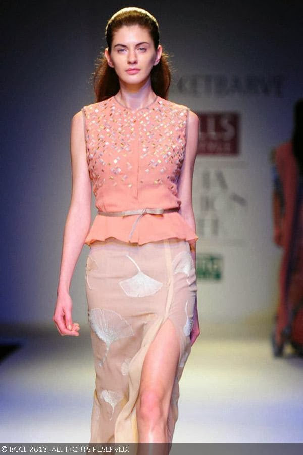 Olga showcases a creation by fashion designer Nachiket Barve on Day 1 of Wills Lifestyle India Fashion Week (WIFW) Spring/Summer 2014, held in Delhi.