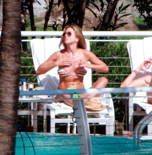 Jennifer Aniston Getting Some Sun In A Multi Colored Bikini 01