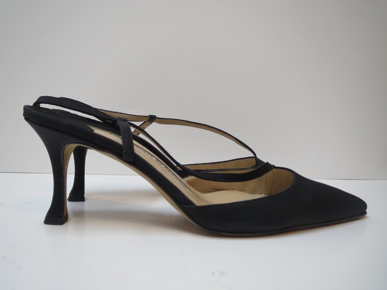 Manolo Blahnik Asymmetrical Slingbacks